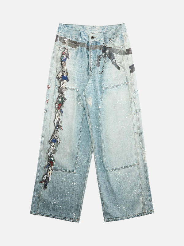 Front view of blue baggy jeans with chain print and ink-splashed design by TALISHKO.