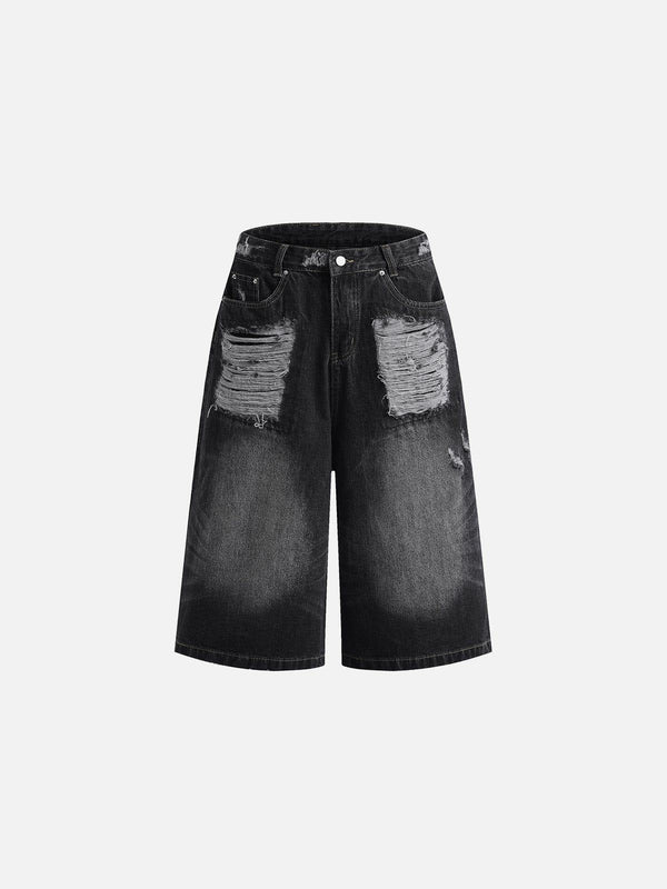 Front view of TALISHKO distressed black jorts, showcasing a washed, edgy summer style.