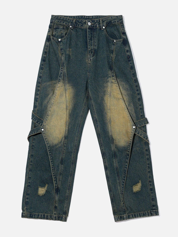 Front view of dark blue distressed jeans with unique stitching by TALISHKO, showcasing urban style.