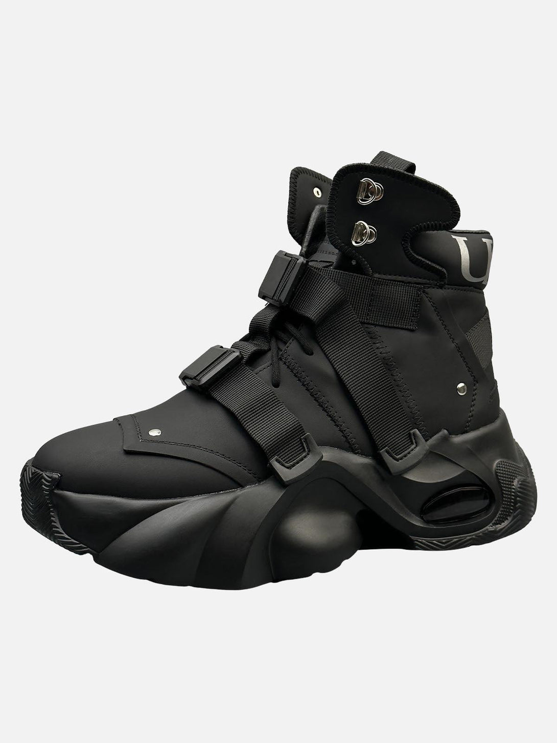 Black dual-strap boots by TALISHKO, showcasing a modern design perfect for urban style.