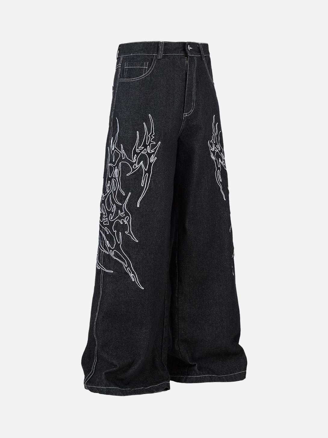 Side view of black baggy jeans with flame embroidery, designed by TALISHKO.