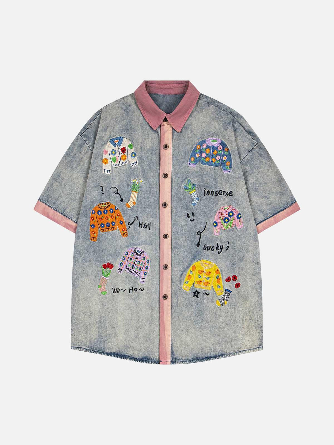 Front view of a blue embroidered patch denim shirt by TALISHKO, featuring playful designs.