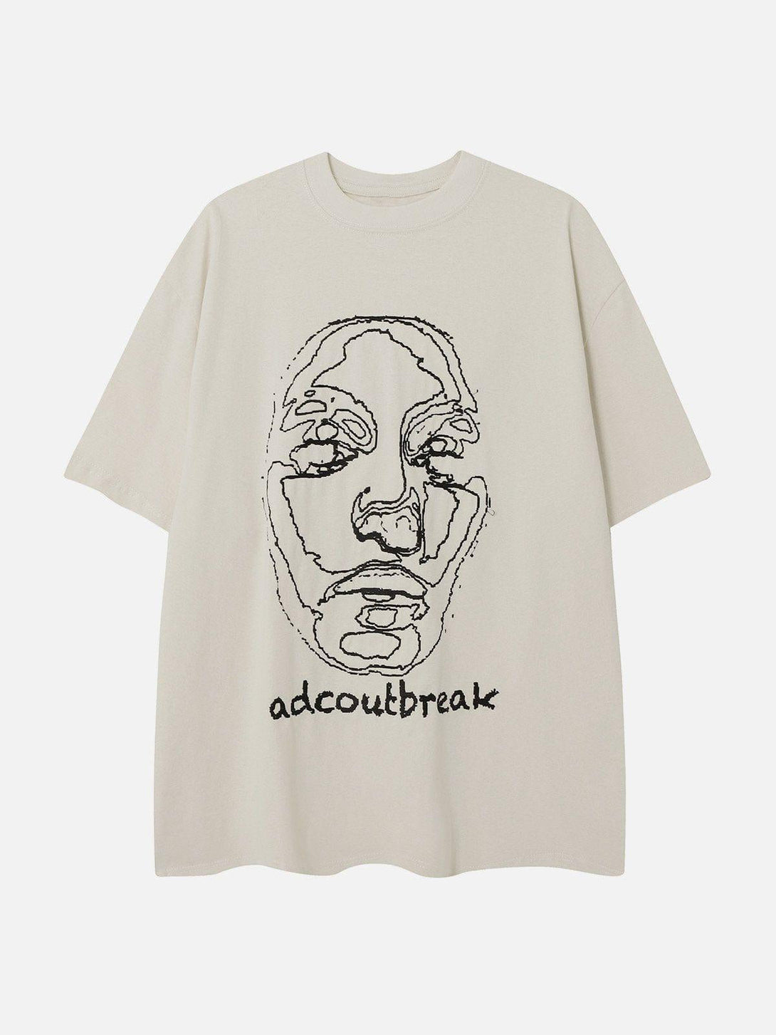Front view of an apricot TALISHKO tee with unique abstract face embroidery design.