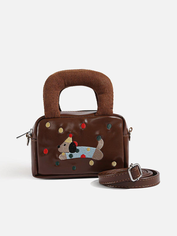 Brown embroidered cartoon dog bag with textured handles and detachable strap by TALISHKO.