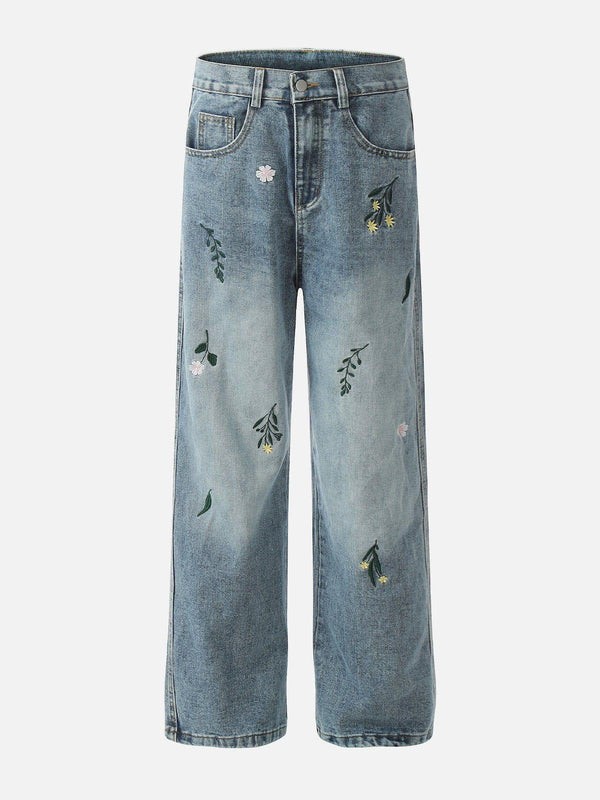 Blue embroidered jeans with floral details by TALISHKO, front view, showcasing casual style.