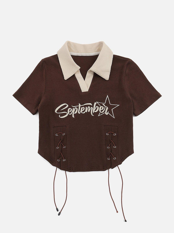 Front view of a coffee-colored fold-over collar tee with star embroidery and side drawstrings by TALISHKO.