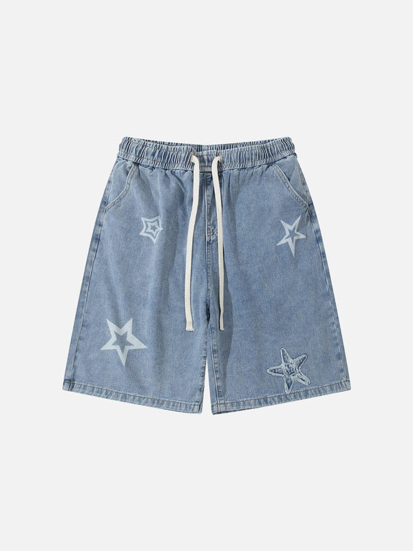 Blue denim jorts with star embroidery by TALISHKO, showcasing a relaxed front view.