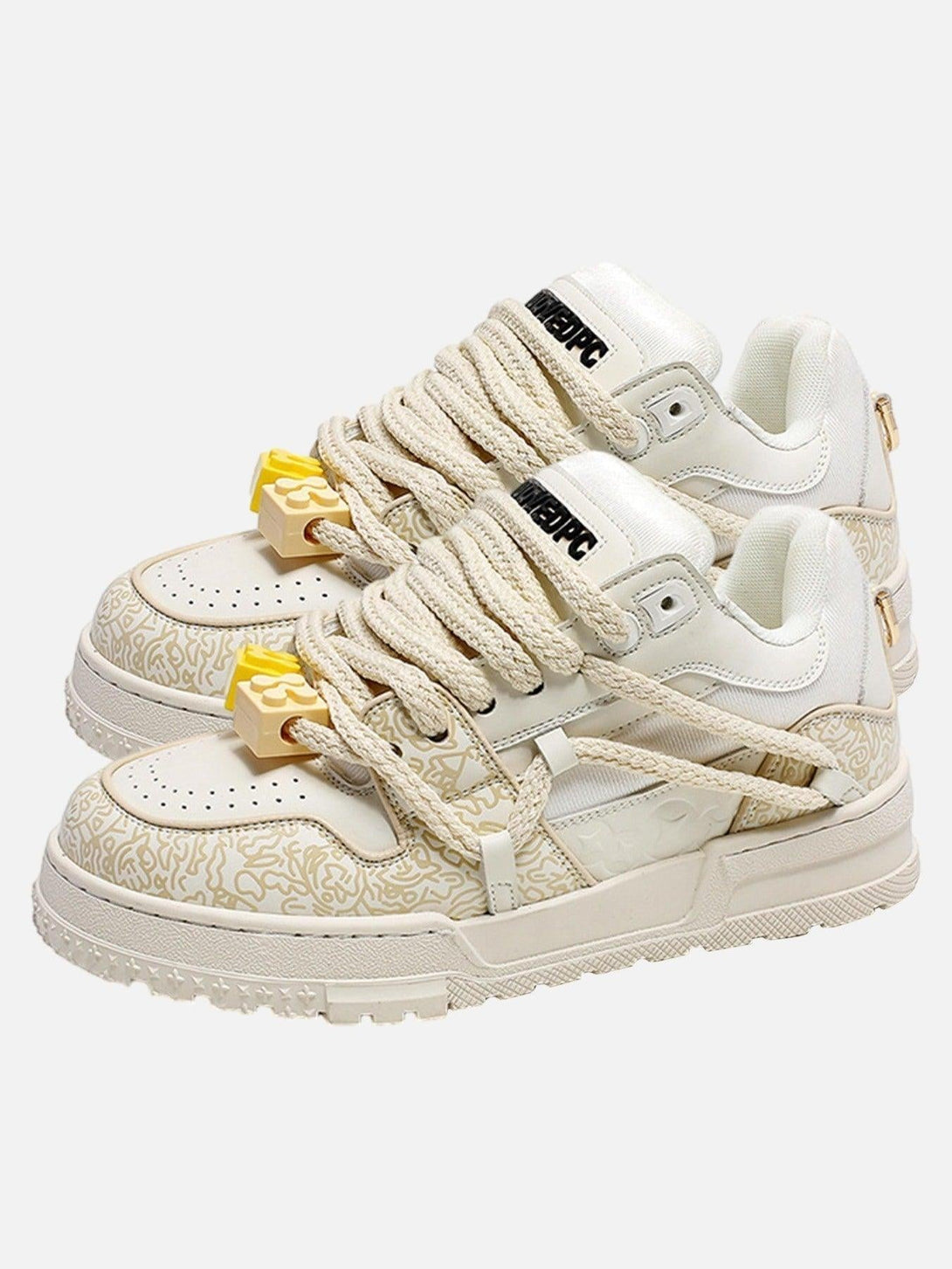 TALISHKO sneakers in white with intricate patterns and thick laces, perfect for casual style.