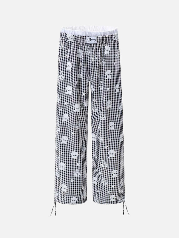 Front view of checkered plaid sweatpants by TALISHKO, featuring a playful print design.