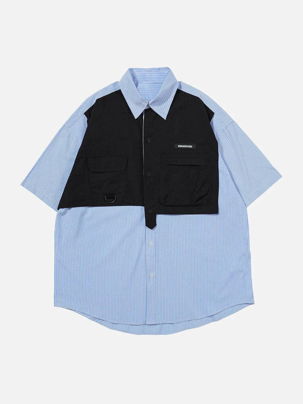 Front view of a blue patchwork short sleeve shirt by TALISHKO, featuring a unique layered design.