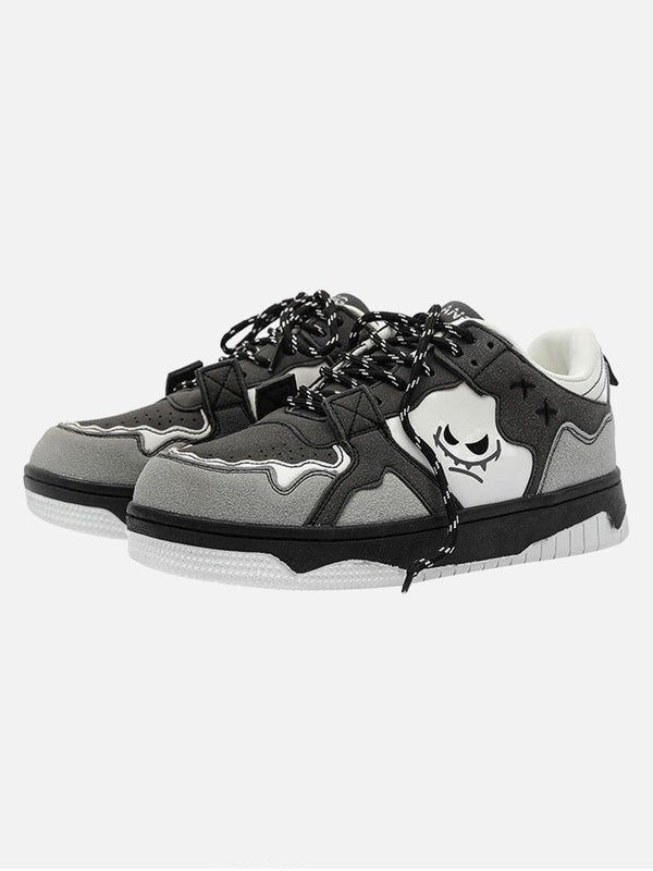 Front view of gray sports board shoes by TALISHKO with bold black and white detailing.