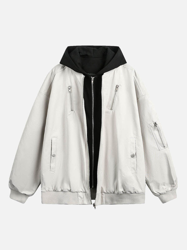 Front view of a white hooded bomber jacket by TALISHKO with multiple pockets and spliced design.