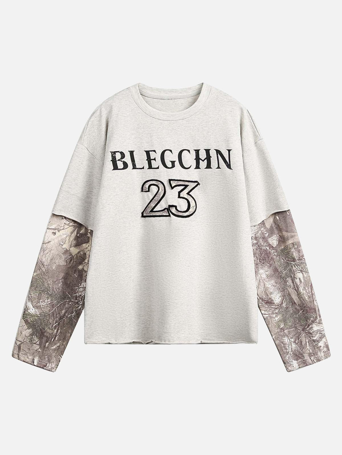 Front view of apricot faux two-piece print long-sleeve T-shirt by TALISHKO, featuring unique sleeves.