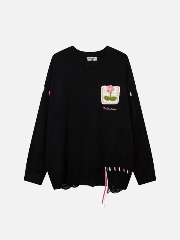 Front view of a black crew neck sweater by TALISHKO, featuring floral embroidery and distressed details.