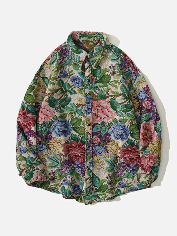 Floral embroidered long-sleeved shirt by TALISHKO, featuring vibrant green and multicolor blooms.