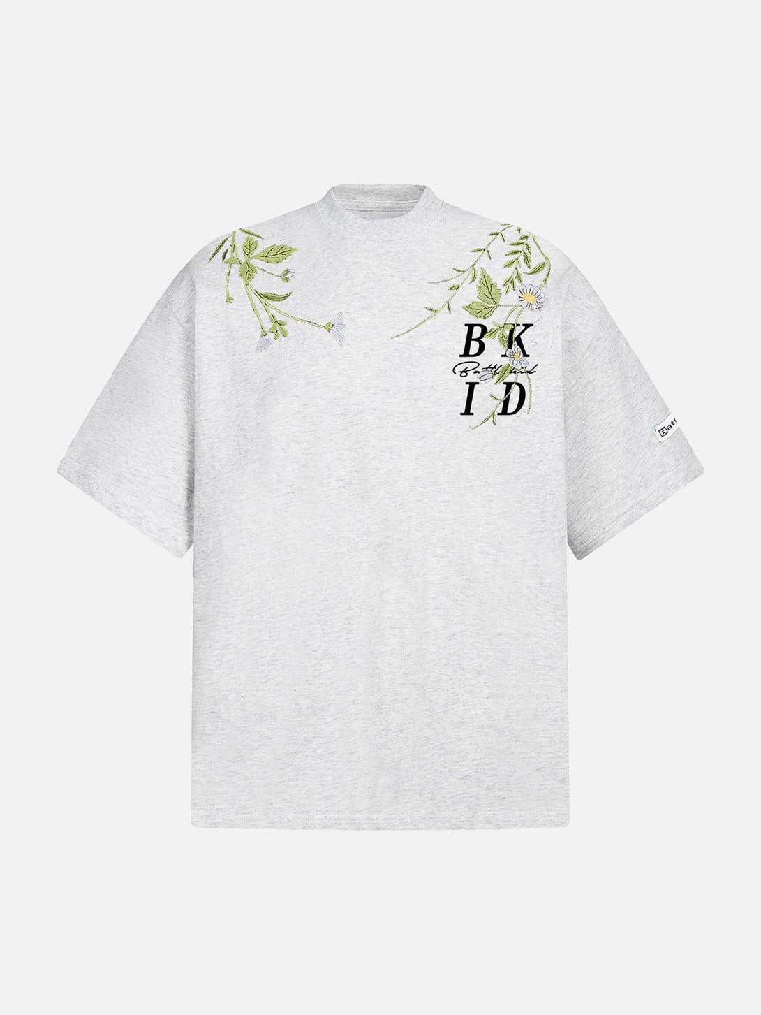 Front view of a gray oversized floral embroidered t-shirt by TALISHKO, perfect for warm days.