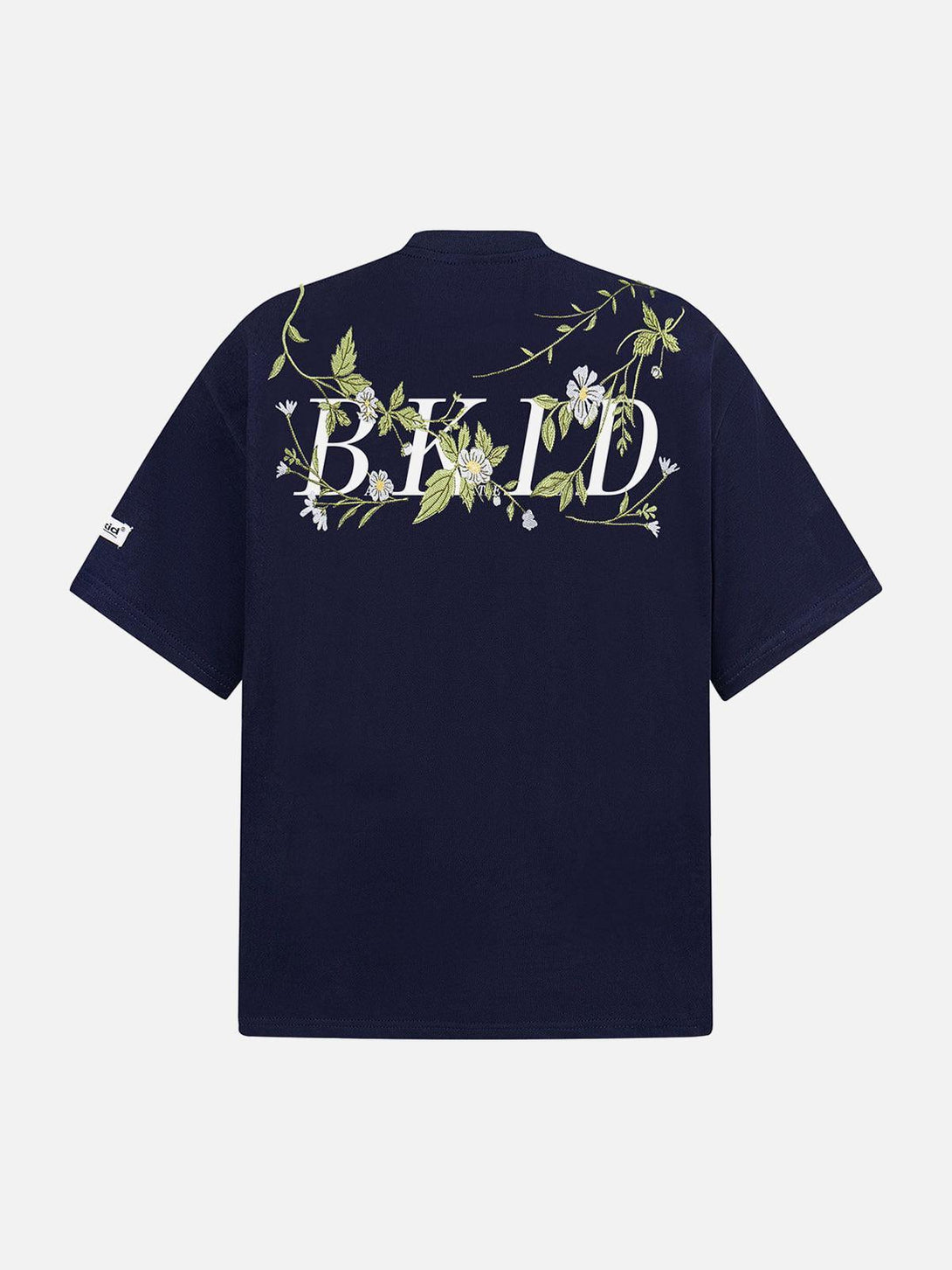 Back view of a navy oversized t-shirt with floral embroidery by TALISHKO, ideal for casual wear.