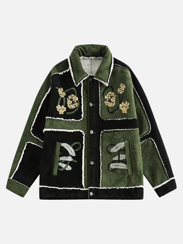 Front view of a green floral embroidered suede fleece jacket by TALISHKO, showcasing unique street style.