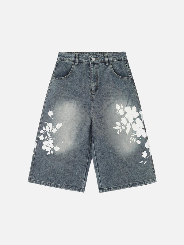 Front view of blue floral print denim shorts by TALISHKO, ideal for a casual summer look.
