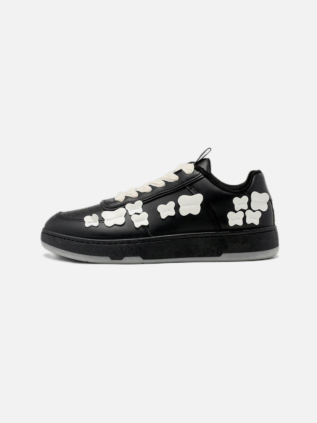 Side view of black skate shoes with white butterfly details by TALISHKO, perfect for urban style.