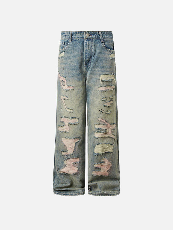Front view of TALISHKO blue distressed jeans featuring unique fringe details for urban style.