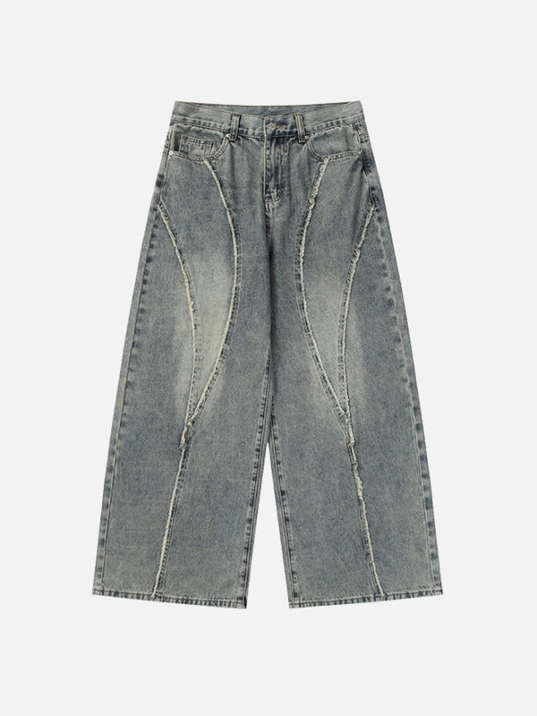 Front view of gray fringe patchwork loose jeans by TALISHKO, showcasing a unique streetwear style.