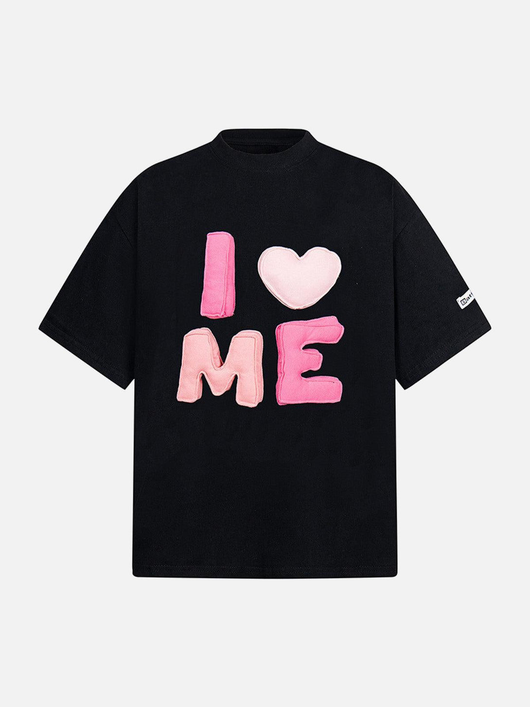 Front view of a black "I Love Me" embroidered T-shirt by TALISHKO, featuring playful pink lettering.