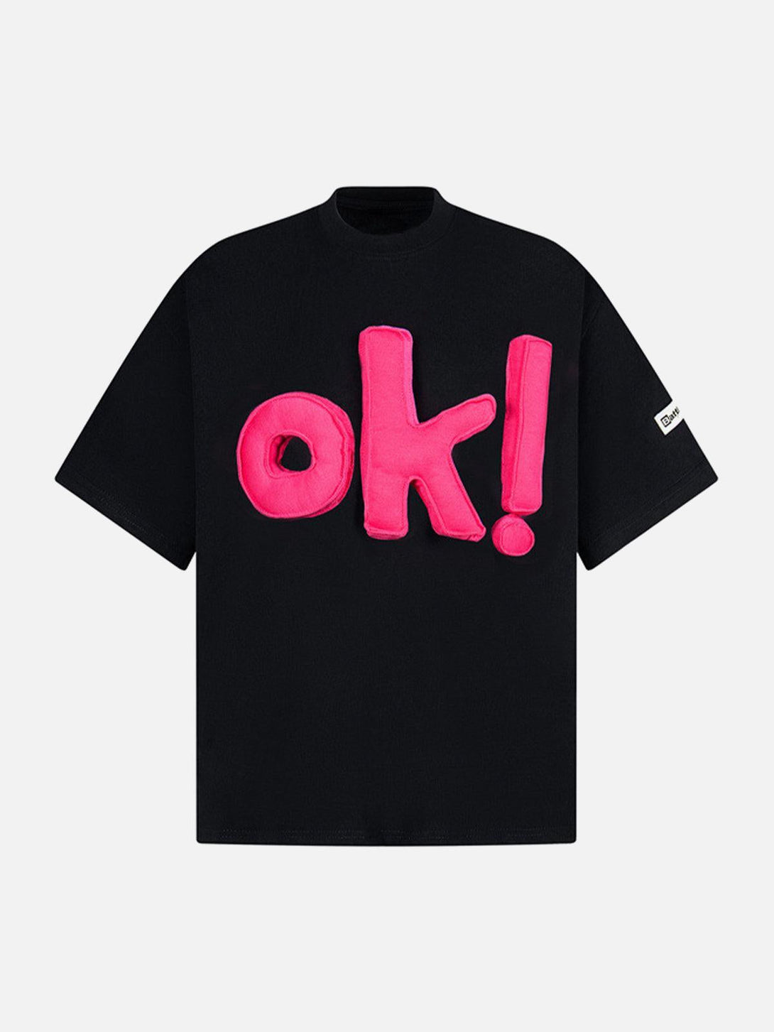 Front view of black graphic T-shirt with bold pink "OK!" design by TALISHKO.