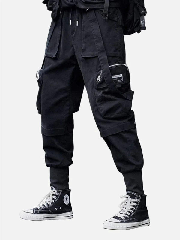Men's black cargo pants with ribbons and pockets, styled with sneakers by TALISHKO.