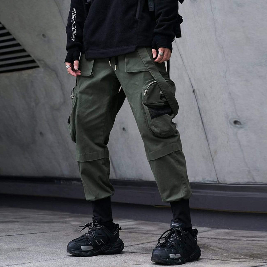 TALISHKO green cargo pants with functional pockets and unique details, styled with sneakers.
