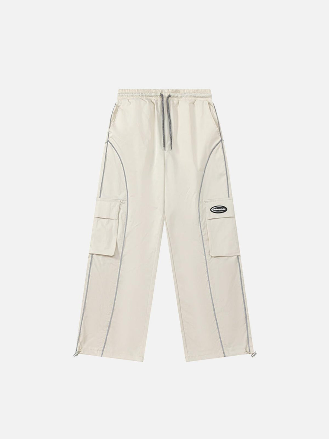 Front view of beige cargo pants by TALISHKO, featuring functional pockets and sleek lines.