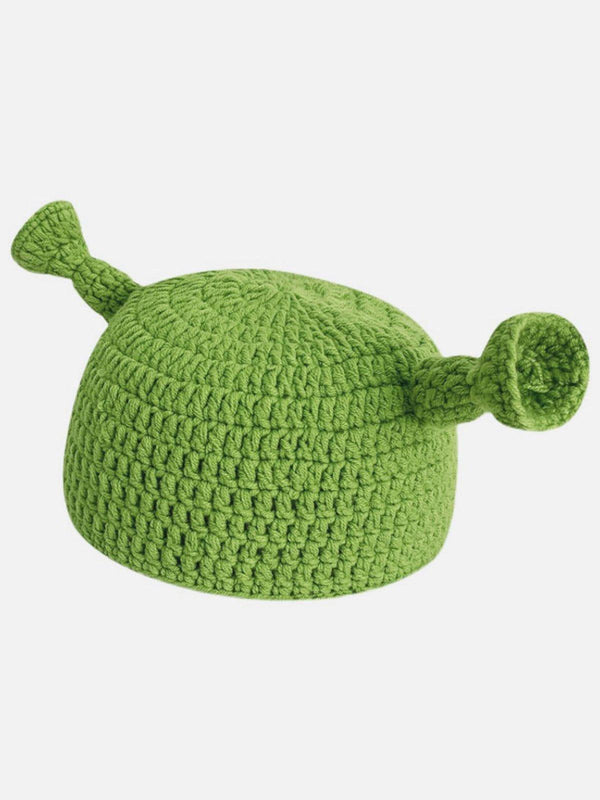 Green crochet beanie with playful ears by TALISHKO, perfect for adding a fun twist to any outfit.
