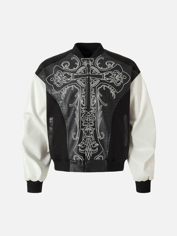 Front view of a black bomber jacket with gothic cross embroidery, featuring crocodile leather by TALISHKO.