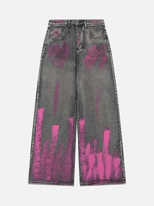 Front view of gray baggy jeans with pink graffiti design by TALISHKO, perfect for urban fashion.