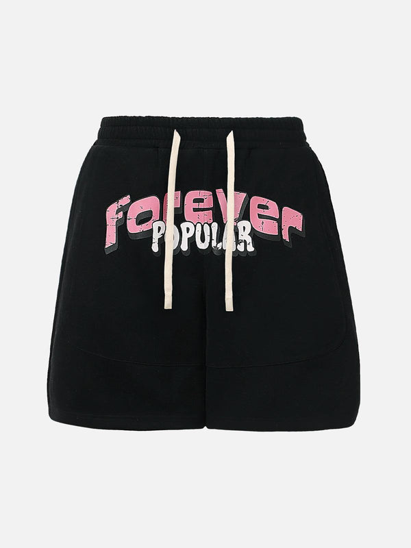 Black cotton shorts by TALISHKO featuring a graffiti design and drawstring in the front view.