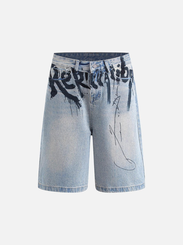 Front view of blue graffiti denim shorts by TALISHKO, featuring bold artistic lettering.