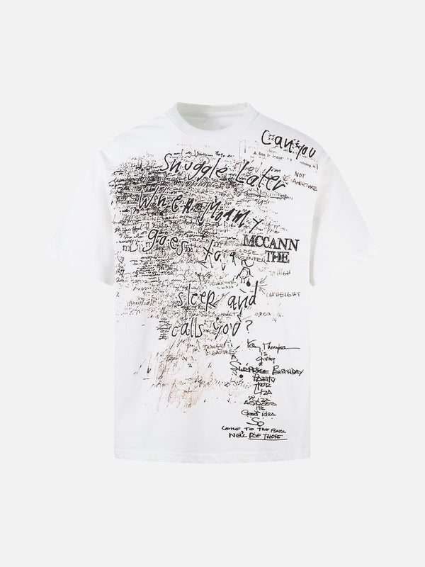 Front view of a white oversized T-shirt with graffiti letter print by TALISHKO, perfect for casual wear.
