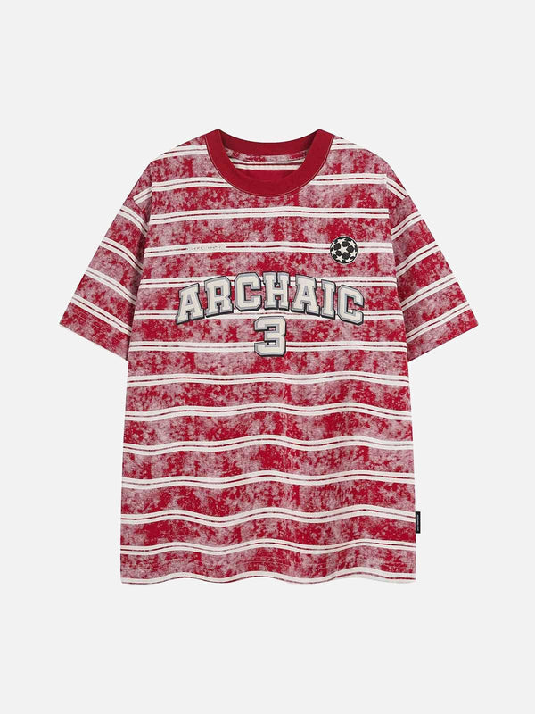 Front view of red striped oversized T-shirt by TALISHKO with graphic lettering detail.