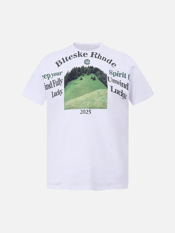 Front view of a white graphic scenic print T-shirt by TALISHKO, ideal for casual summer days.