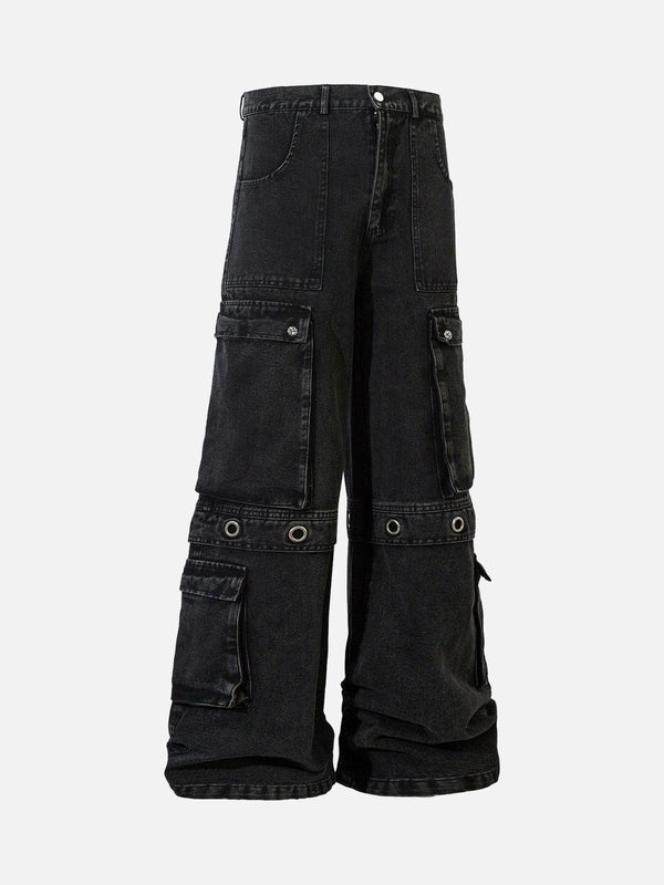 Front view of black cargo jeans by TALISHKO, featuring grommets and multiple pockets.