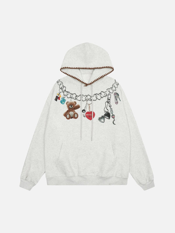 Front view of a white TALISHKO hoodie featuring grunge bear graphics and playful chain details.