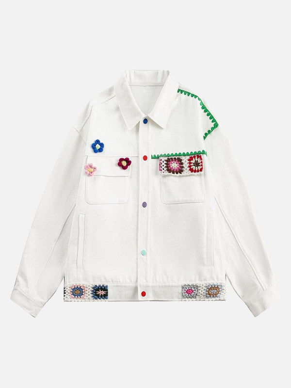 TALISHKO white denim jacket features colorful crochet floral details, perfect for trendy streetwear.