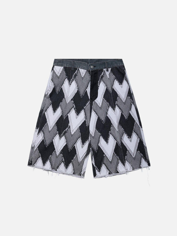 Front view of black heart patchwork jorts by TALISHKO, showcasing unique zigzag pattern.
