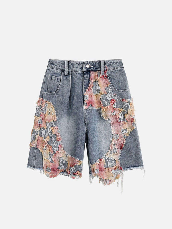 Front view of TALISHKO blue denim jorts featuring intricate lace patchwork detailing.