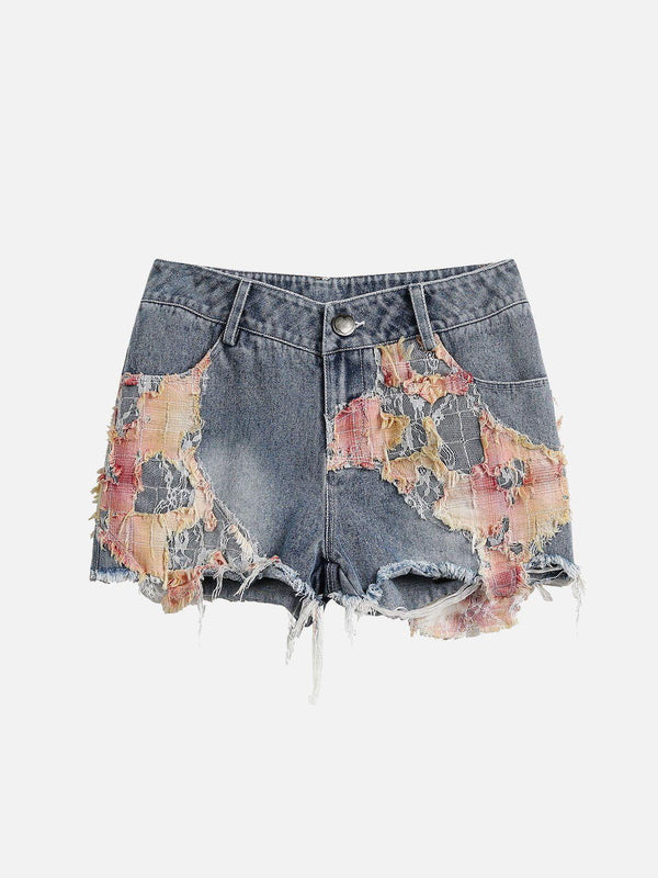Front view of TALISHKO blue denim shorts with intricate lace and distressed detailing.