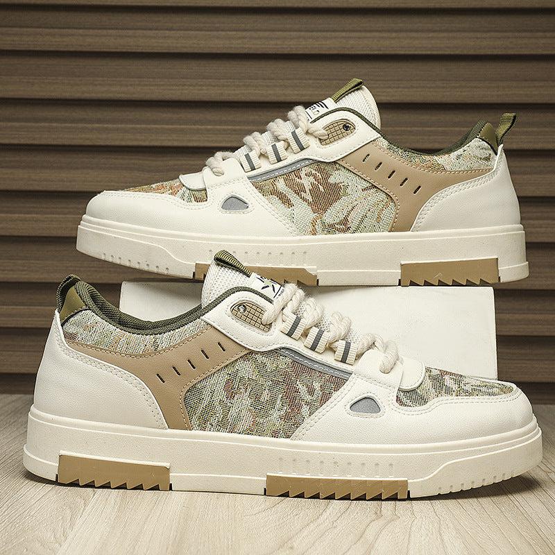 Front view of TALISHKO canvas board shoes in green, showcasing a camo pattern and rugged sole.