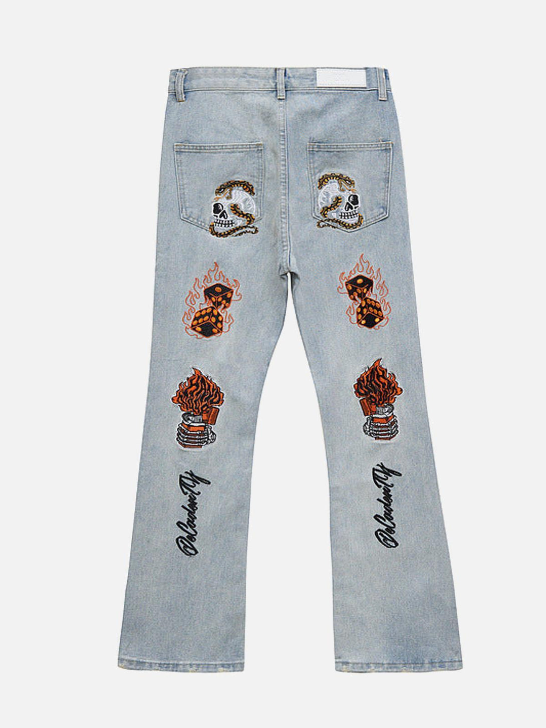 Back view of blue retro embroidered jeans by TALISHKO, featuring skull and flame designs.