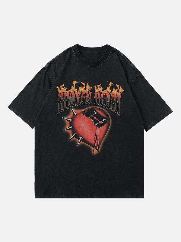 Front view of a black T-shirt with a flaming "Broken Heart" graphic by TALISHKO.