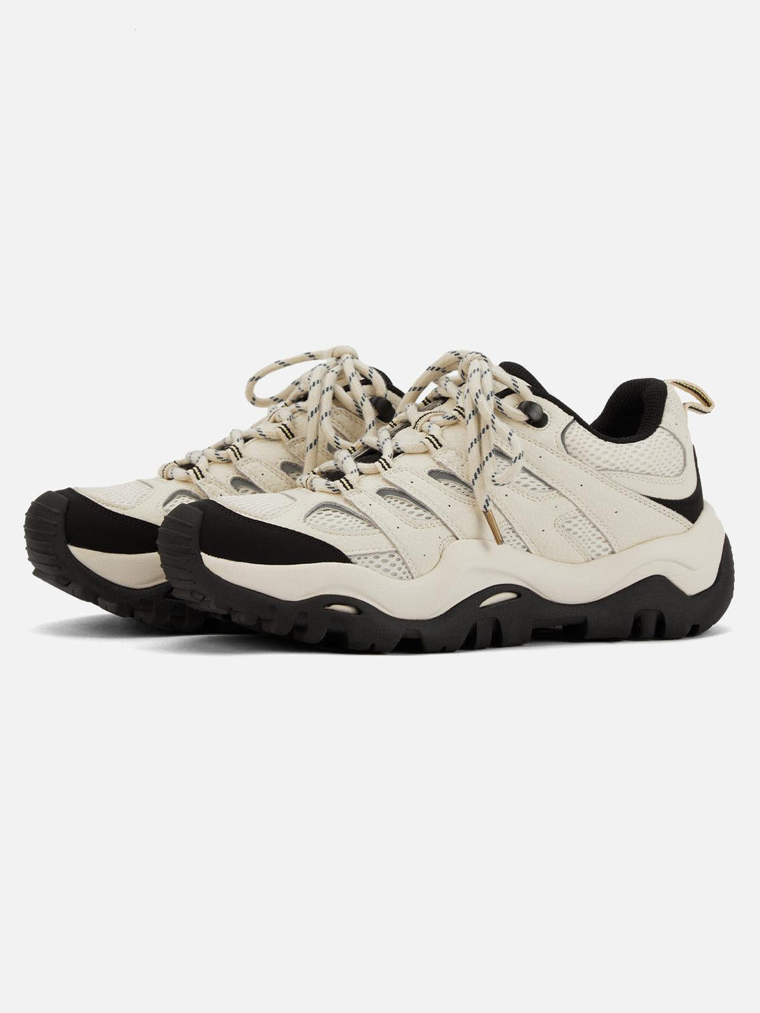 Front view of TALISHKO hiking shoes in white, featuring a rugged design and sporty style.