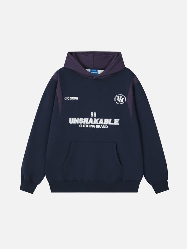 Navy blue hoodie with letter print by TALISHKO, featuring front view design in a modern style.